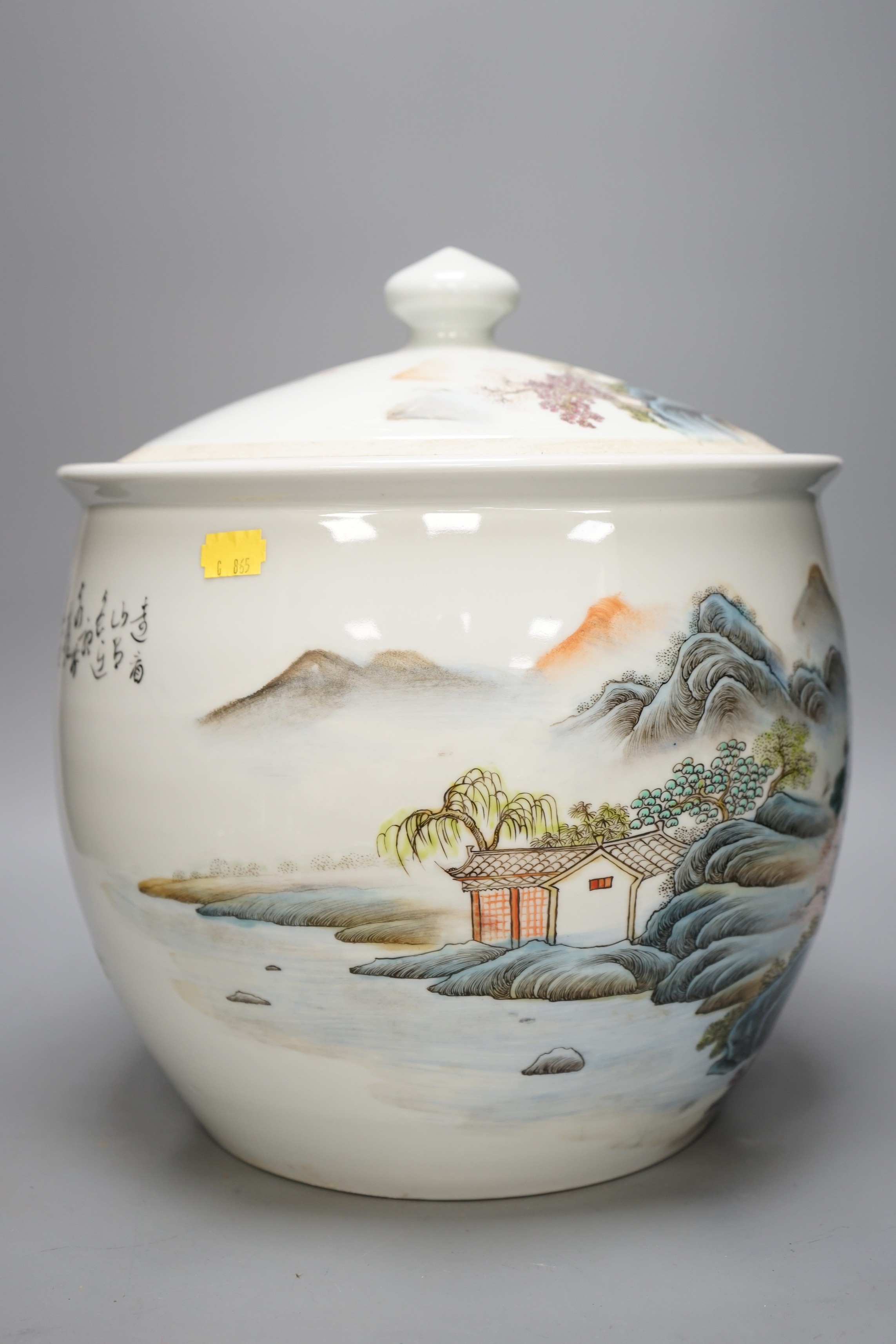 A large Chinese famille rose bowl and cover with mountainous landscape, 34cm tall